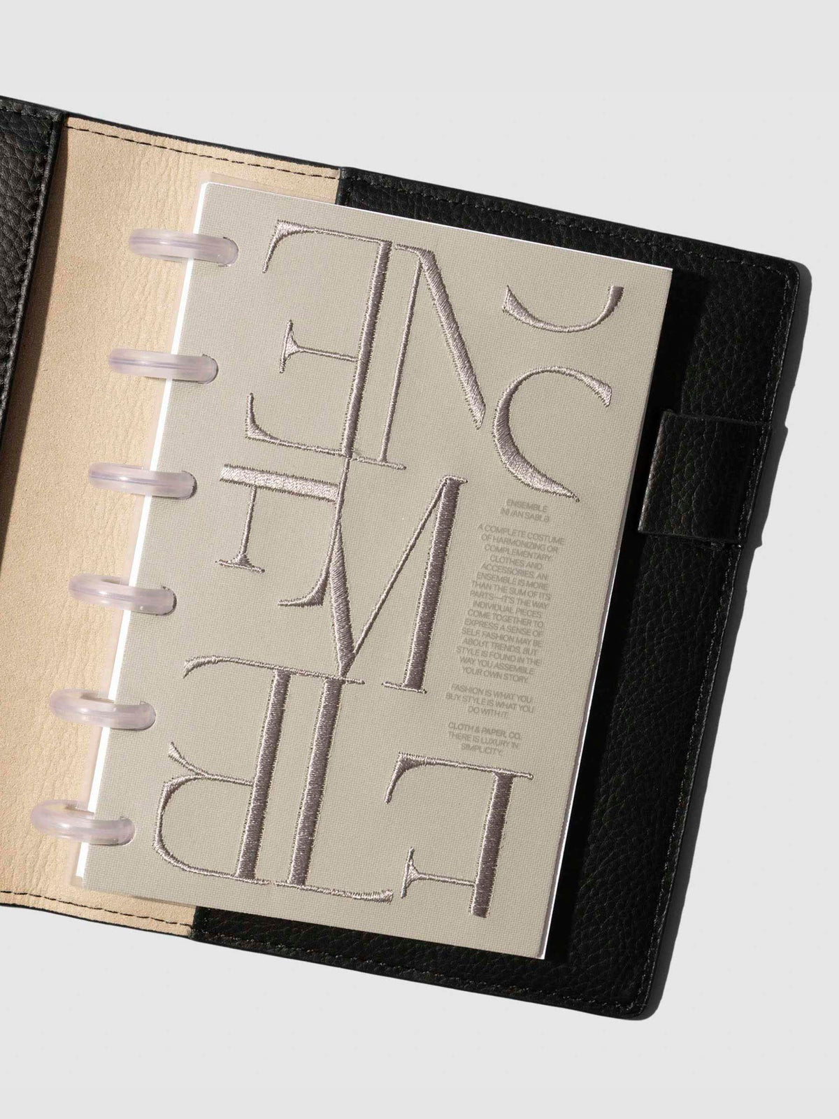 Dashboard displayed in a black planner on a neutral background. Size shown is CP Petite.