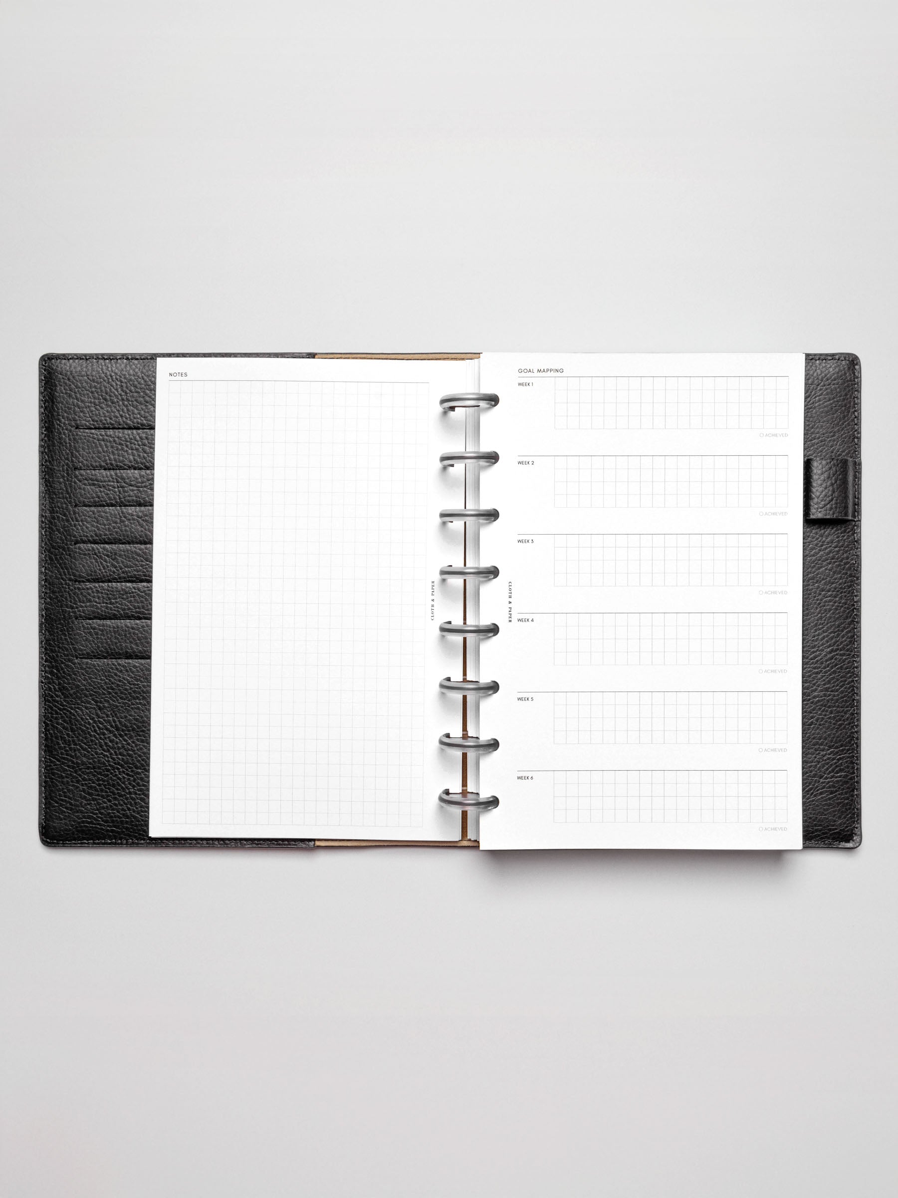 Insert in use inside a discbound planner system. Size shown is HalfLetter.