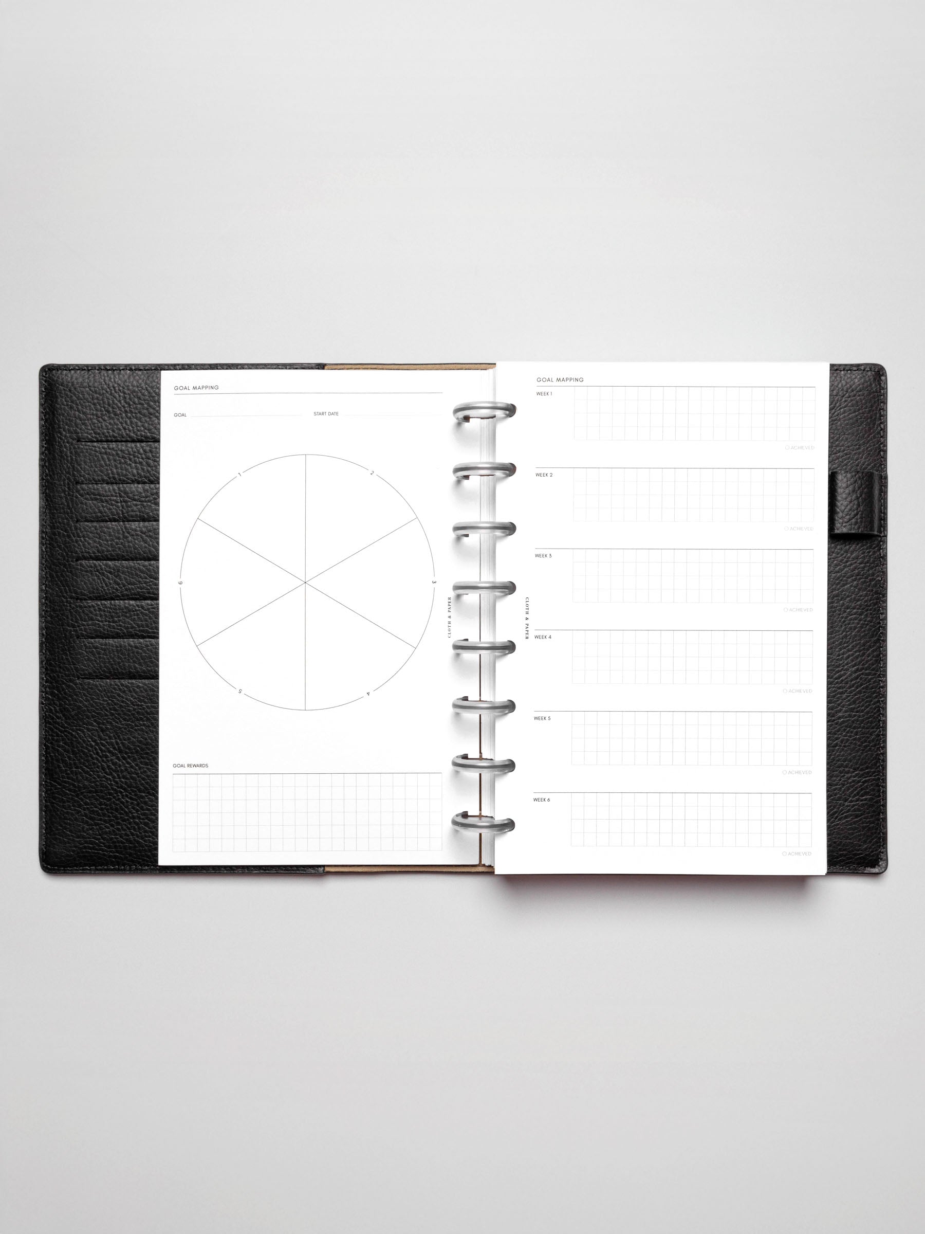 Insert in use inside a discbound planner system. Size shown is HalfLetter.