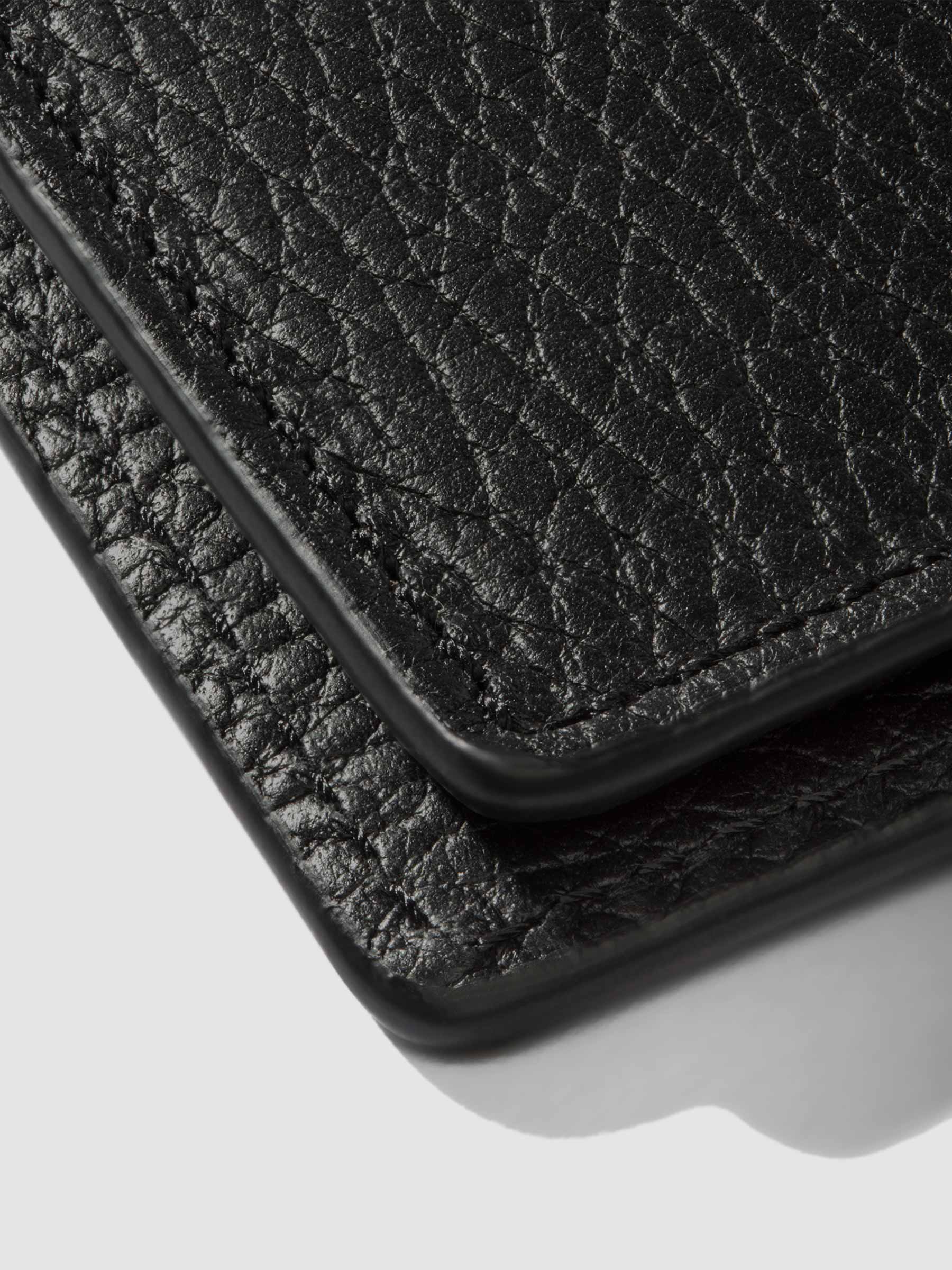 Closeup of Padrillo folio showing the stitching and glazing.