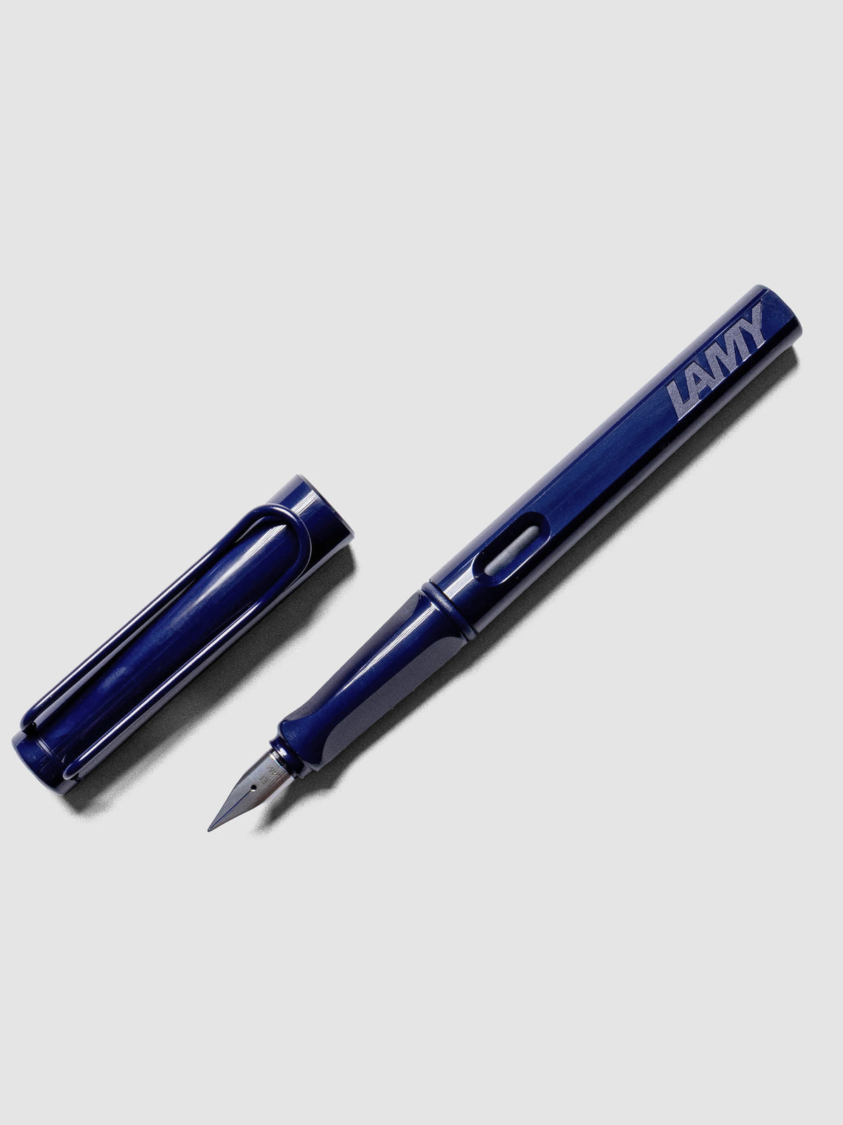 LAMY Safari Fountain Pen in the color Dark Dusk with Extra Fine nib shown diagonally with the cap off. 