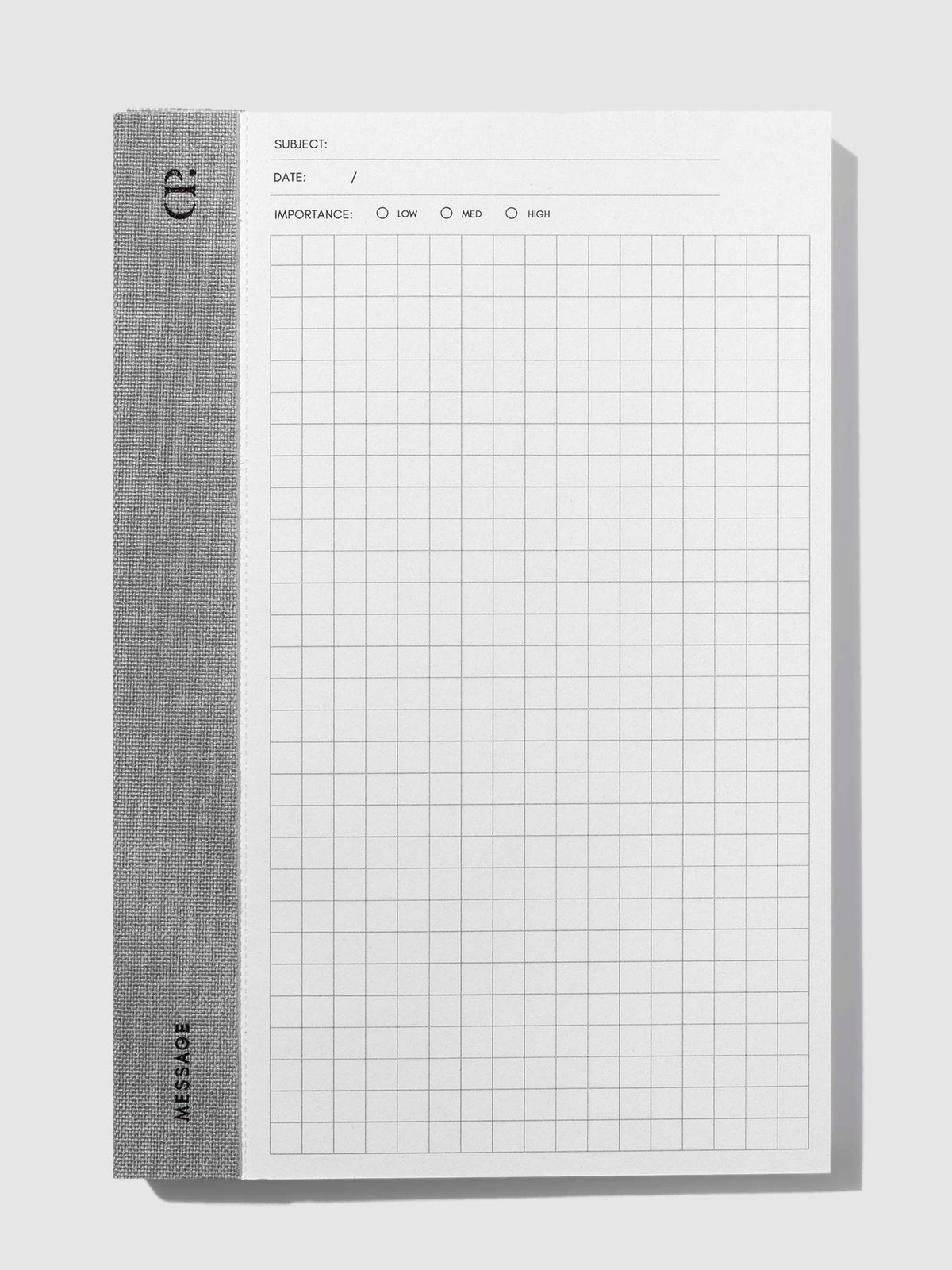 Left Bound Graph Notepad, CP Petite, Cloth and Paper. Notepad displayed on a neutral background.