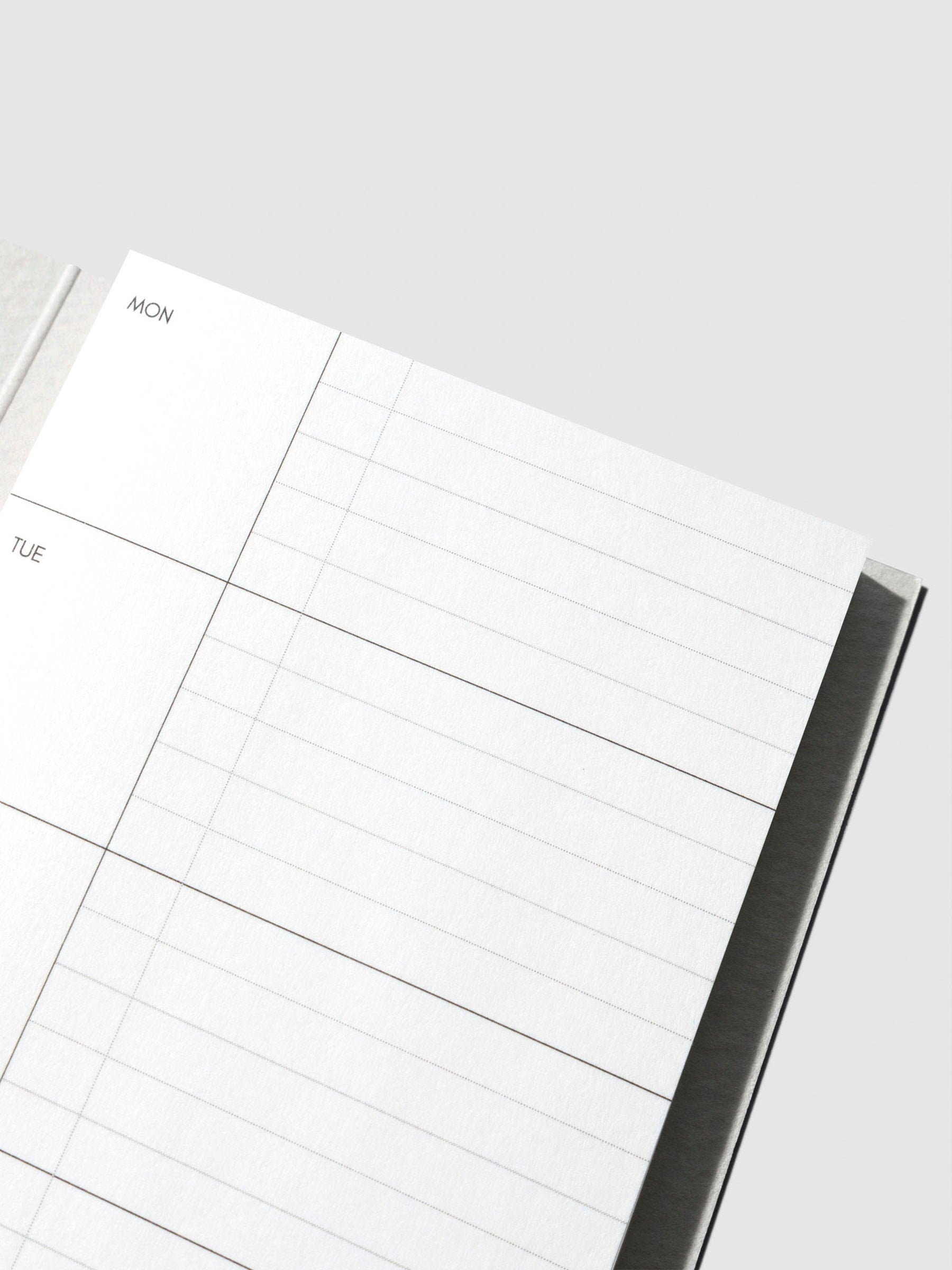 Sticky note displayed with its packaging on a neutral background.