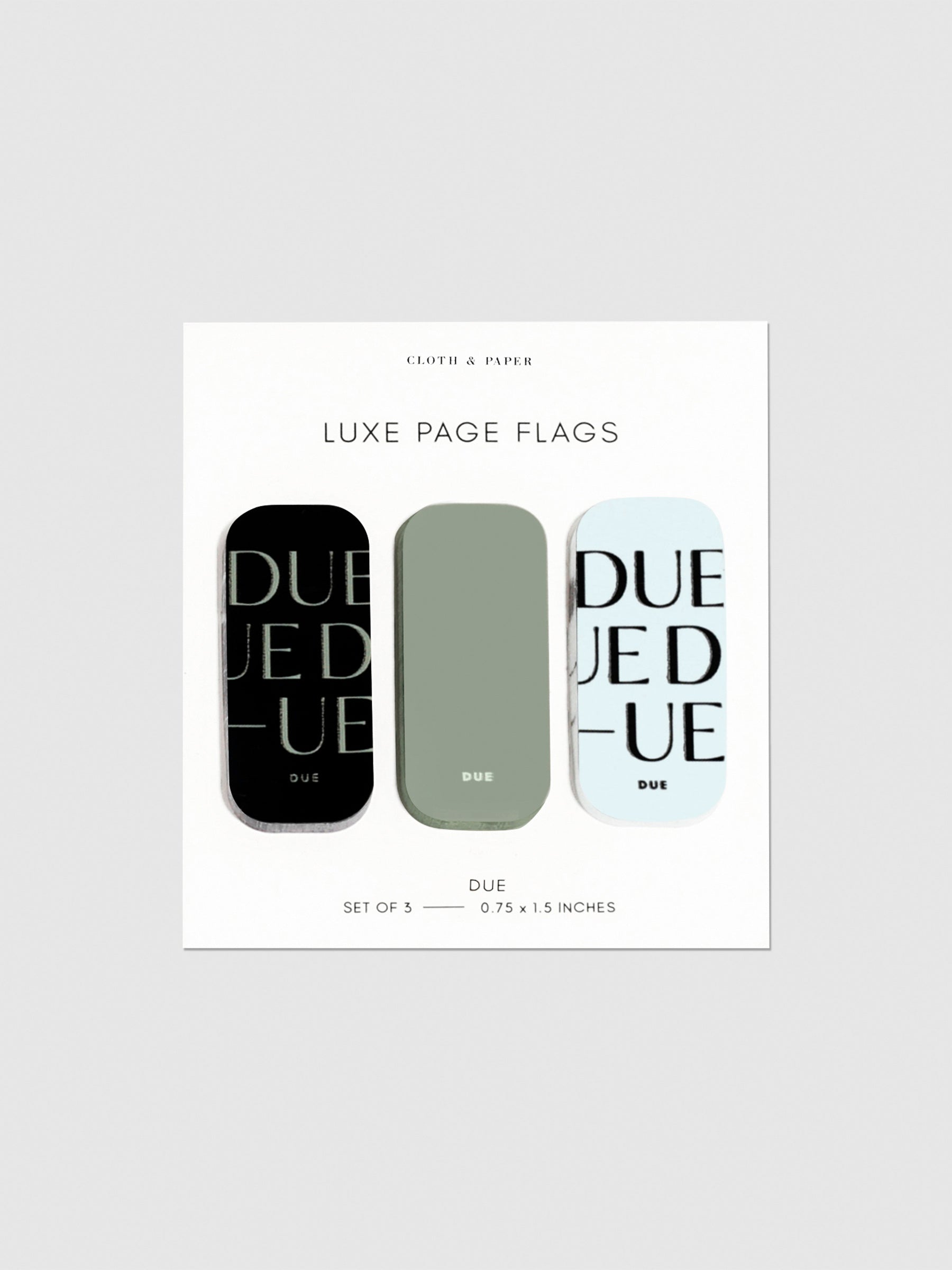 Luxe page flags on their backing on a neutral background. The text on the left and right flag read "Due" repeated multiple times.
