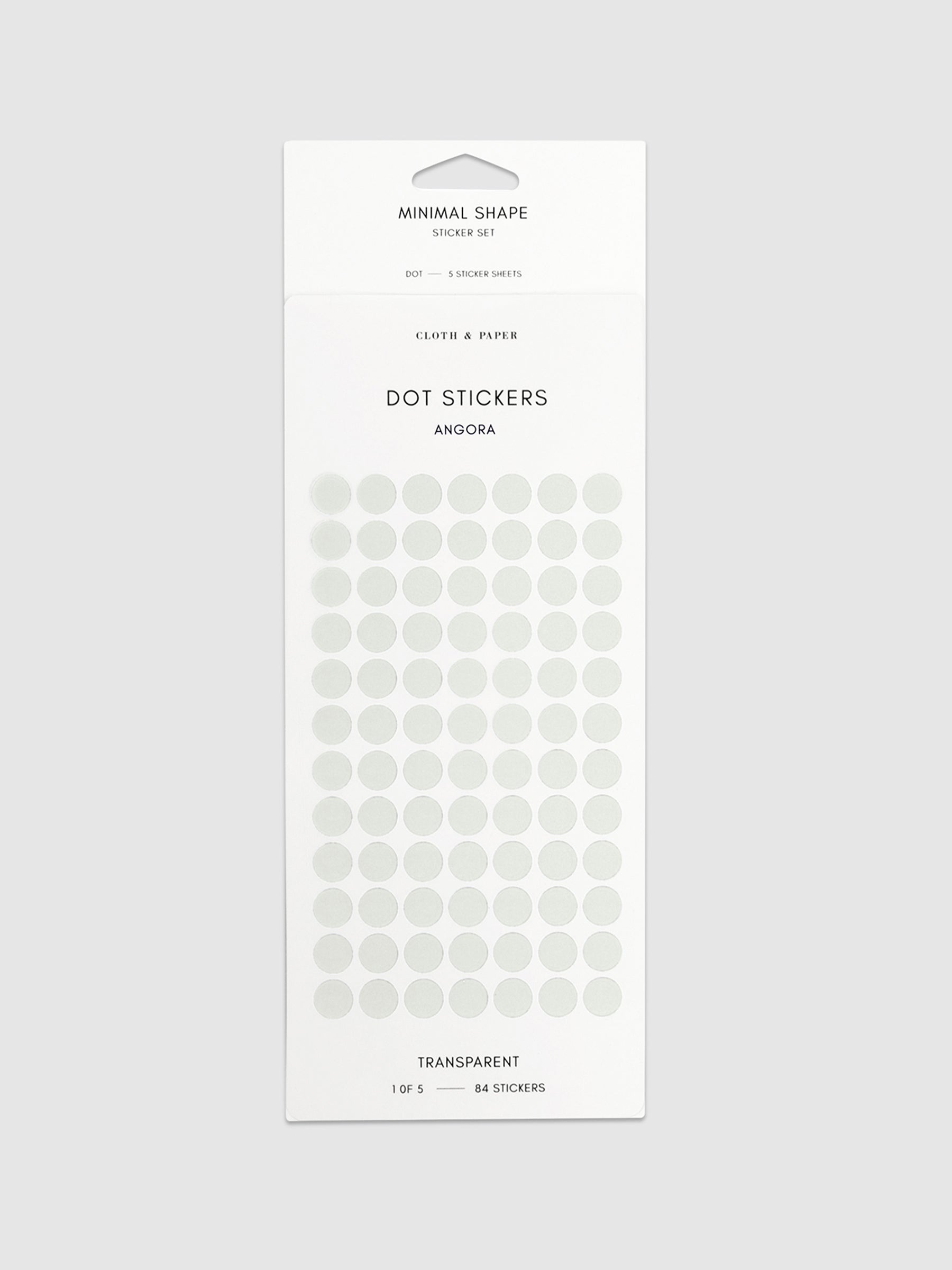 Angora dot stickers in their packaging on a neutral background.