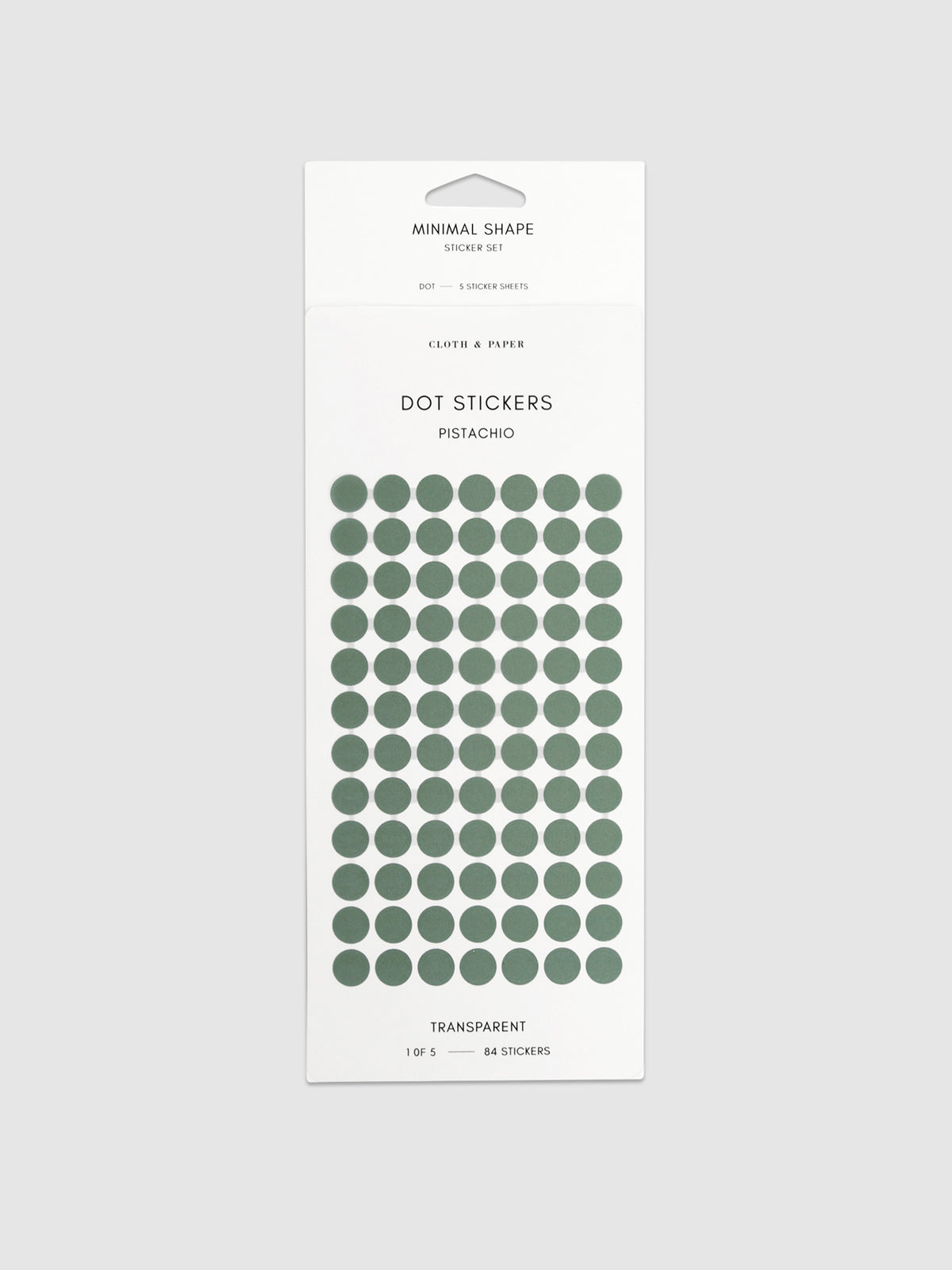 Pistachio dot stickers in their packaging on a neutral background.