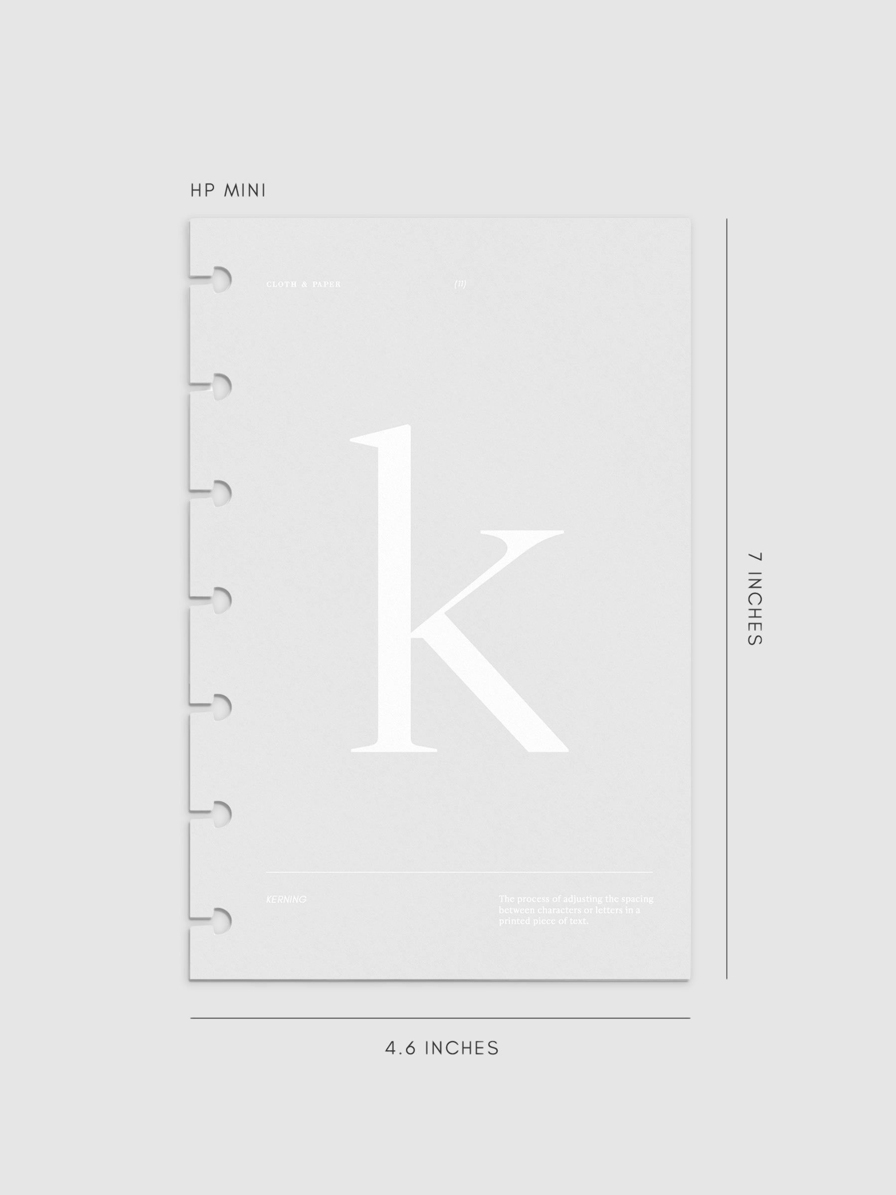 Monogram Vellum Planner Dashboard K  in HP Mini displayed on a neutral background. 
