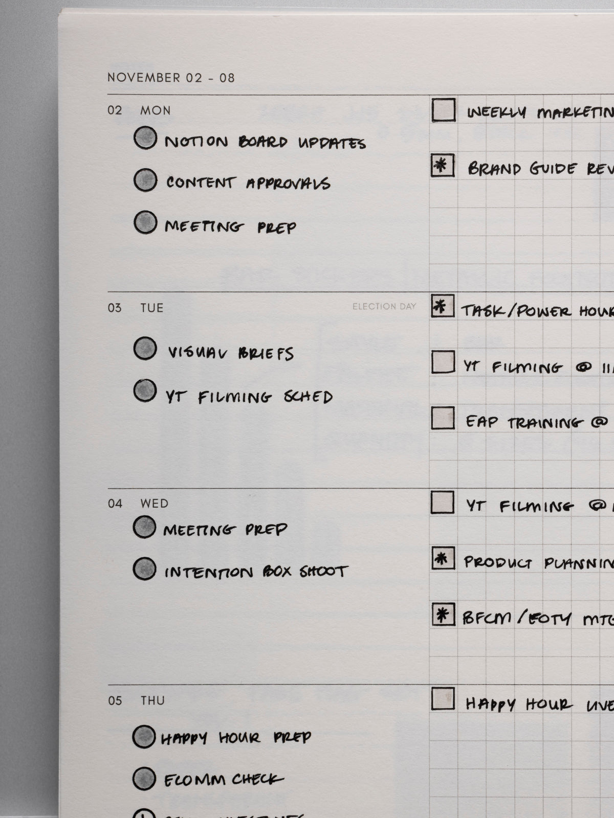 Close up of a weekly layout in the 2026 Weekly Horizontal Notebook | Monday Start | A5 Spiral with handwritten examples of use.