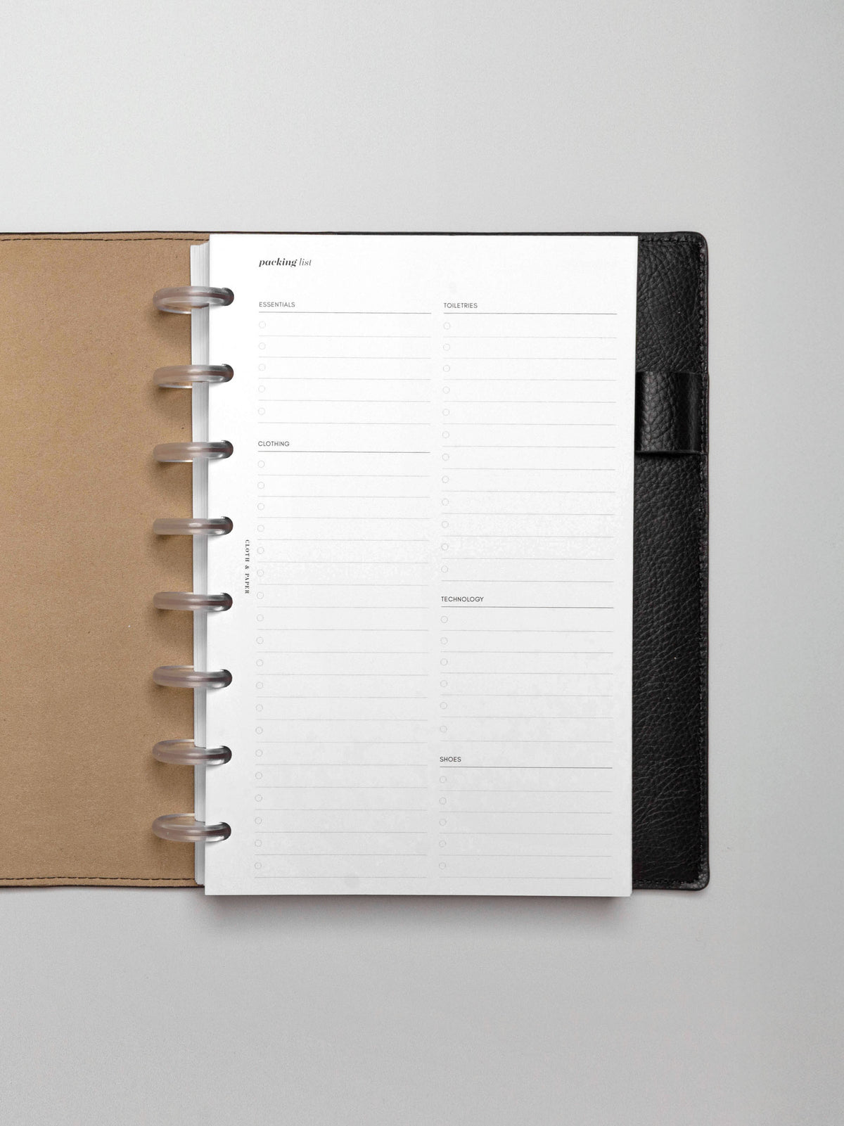Insert in use inside a black leather planner.