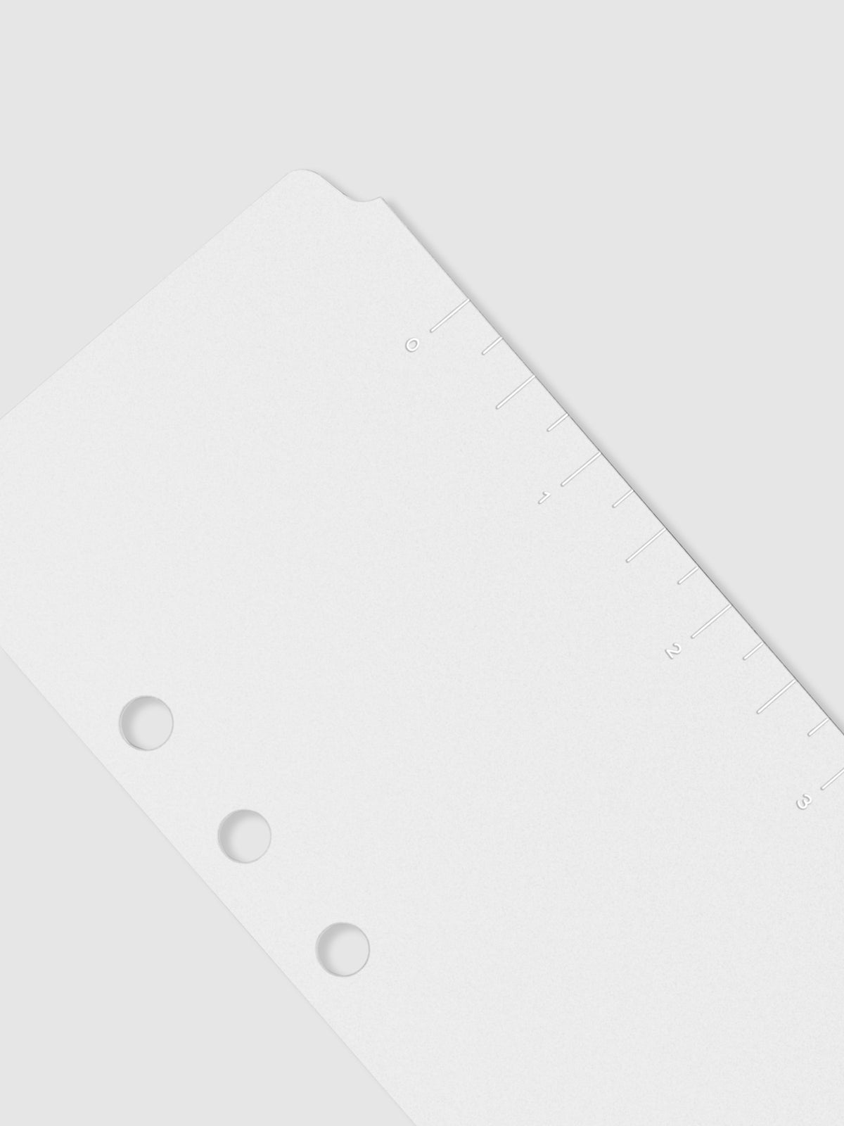 Closeup of page marker on a neutral background.