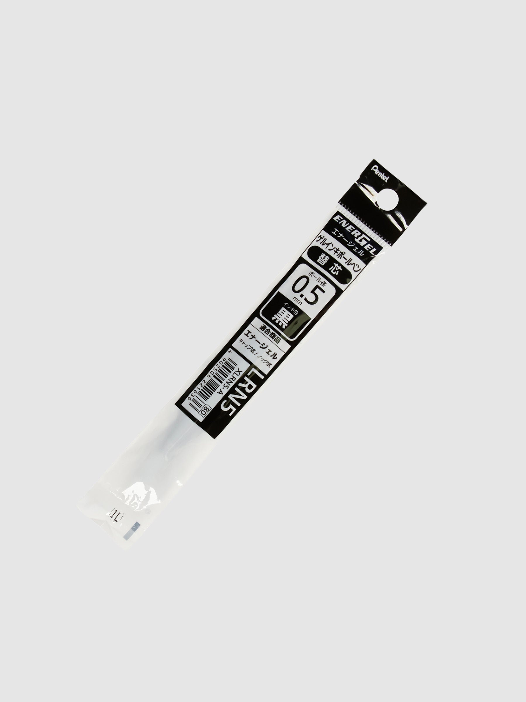 Pen refill in its packaging turned to the right against a neutral background.
