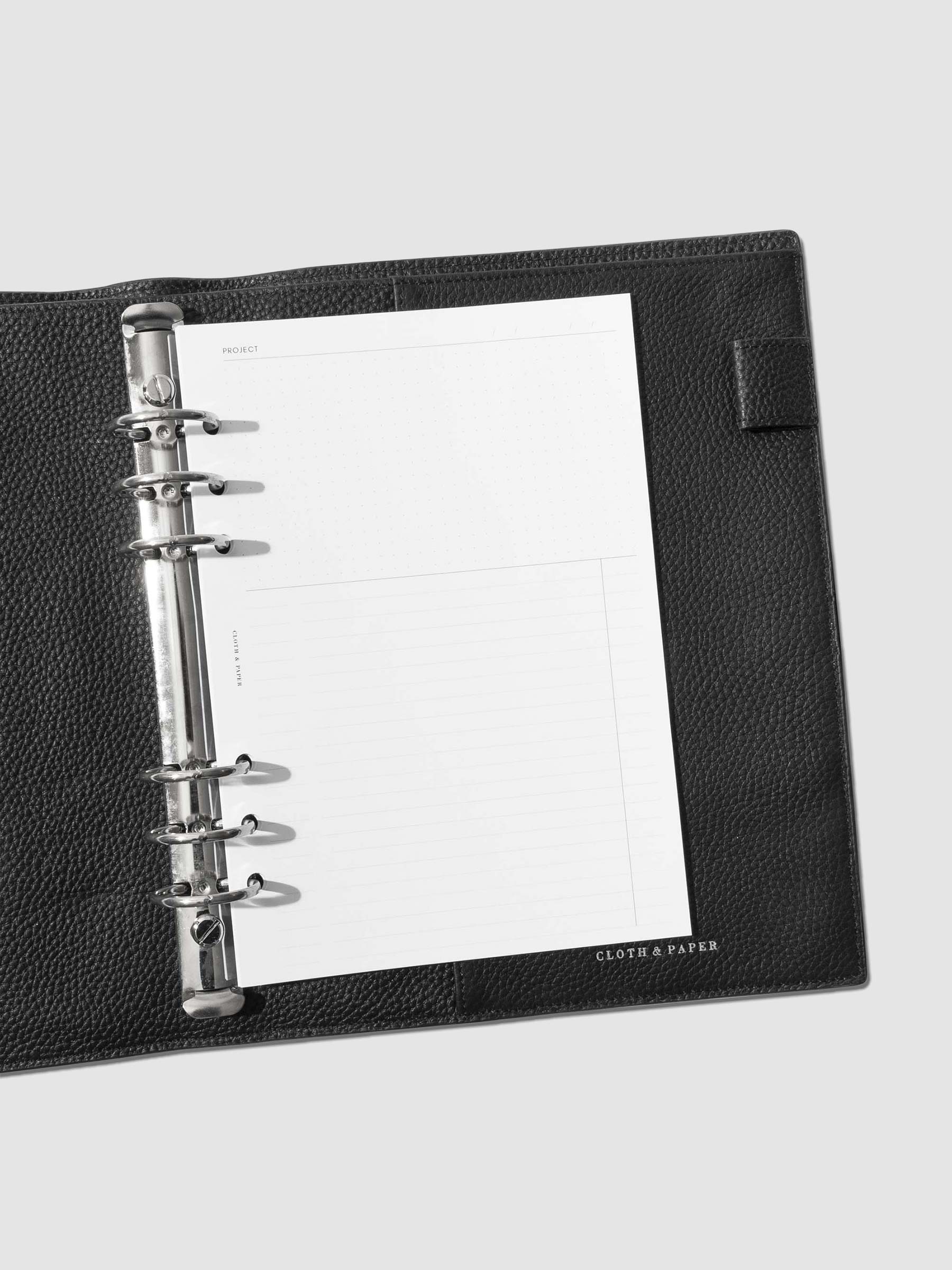 Insert in use inside of a black leather agenda. Size pictured is A5. 