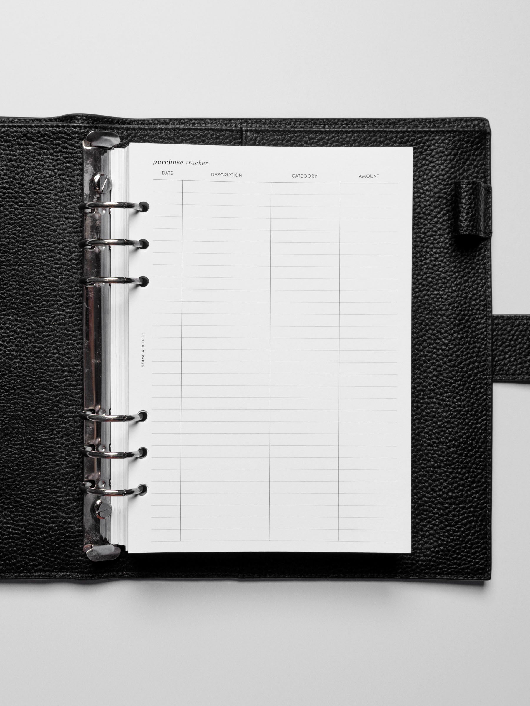 Insert in use inside a black leather planner.