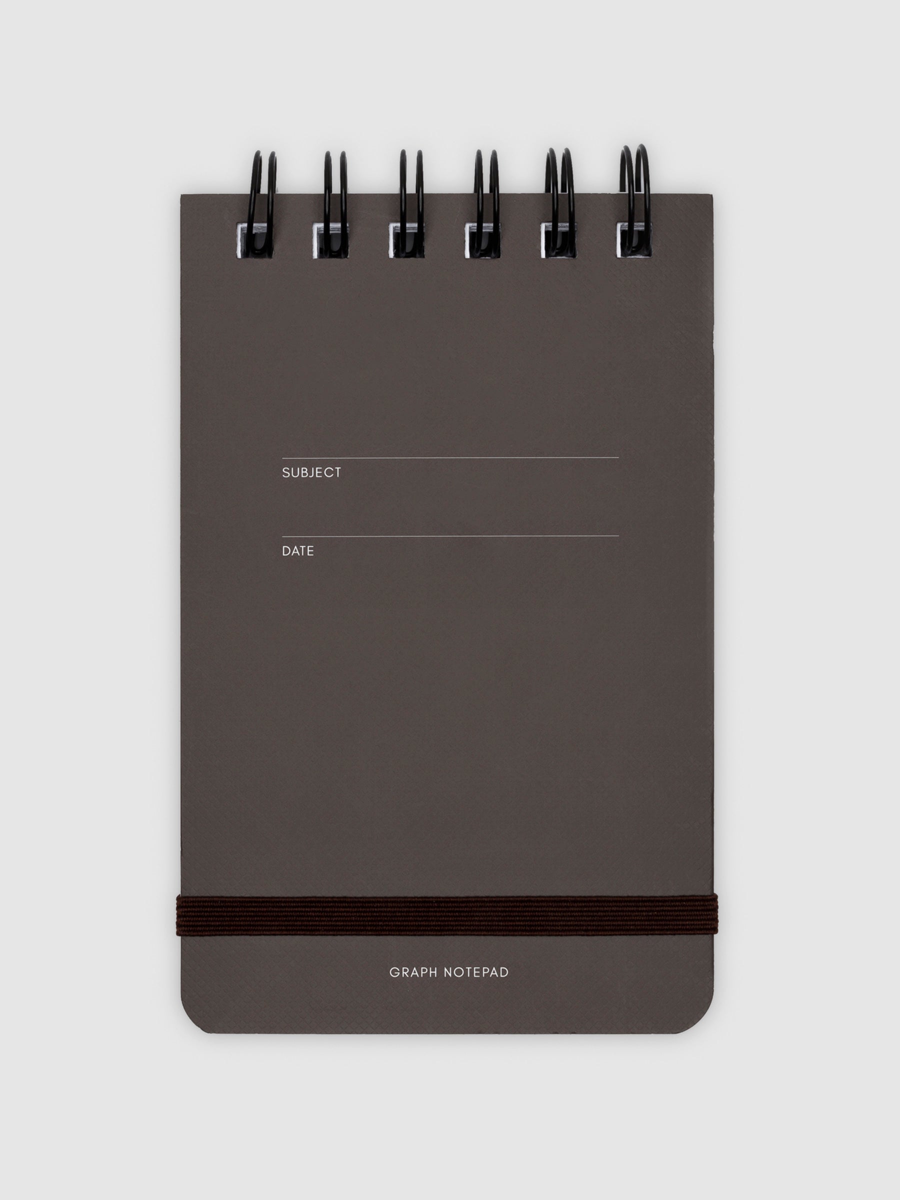 Graph notepad displayed on a neutral background.