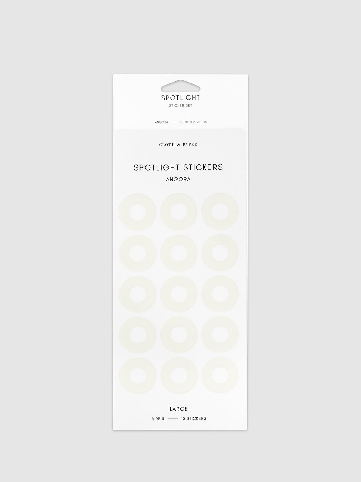 Large spotlight stickers in Angora on a neutral background.