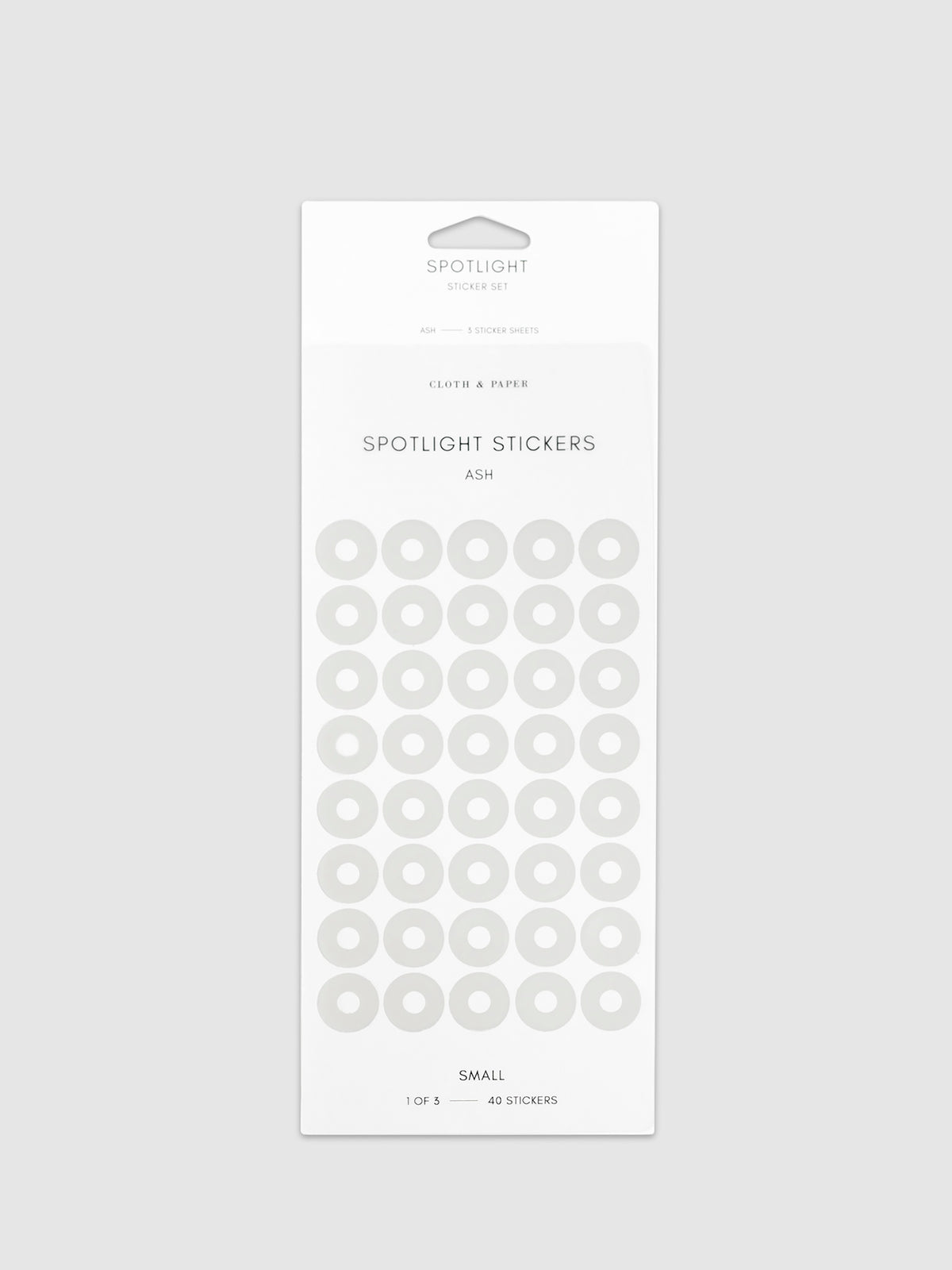 Ash sticker in its packaging displayed on a neutral background. Pictured color is small.