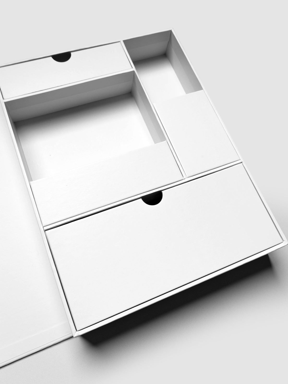 Storage Book 4.0 displaying empty right hand side with two open compartments and two drawer compartments.