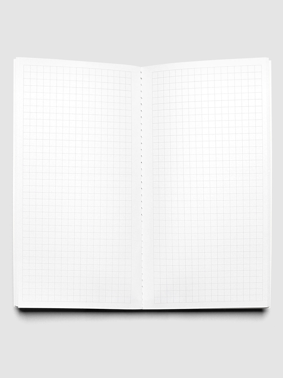 Travel Notebook | A5 Slim | Olive | Graph shown open displaying graph note pages.