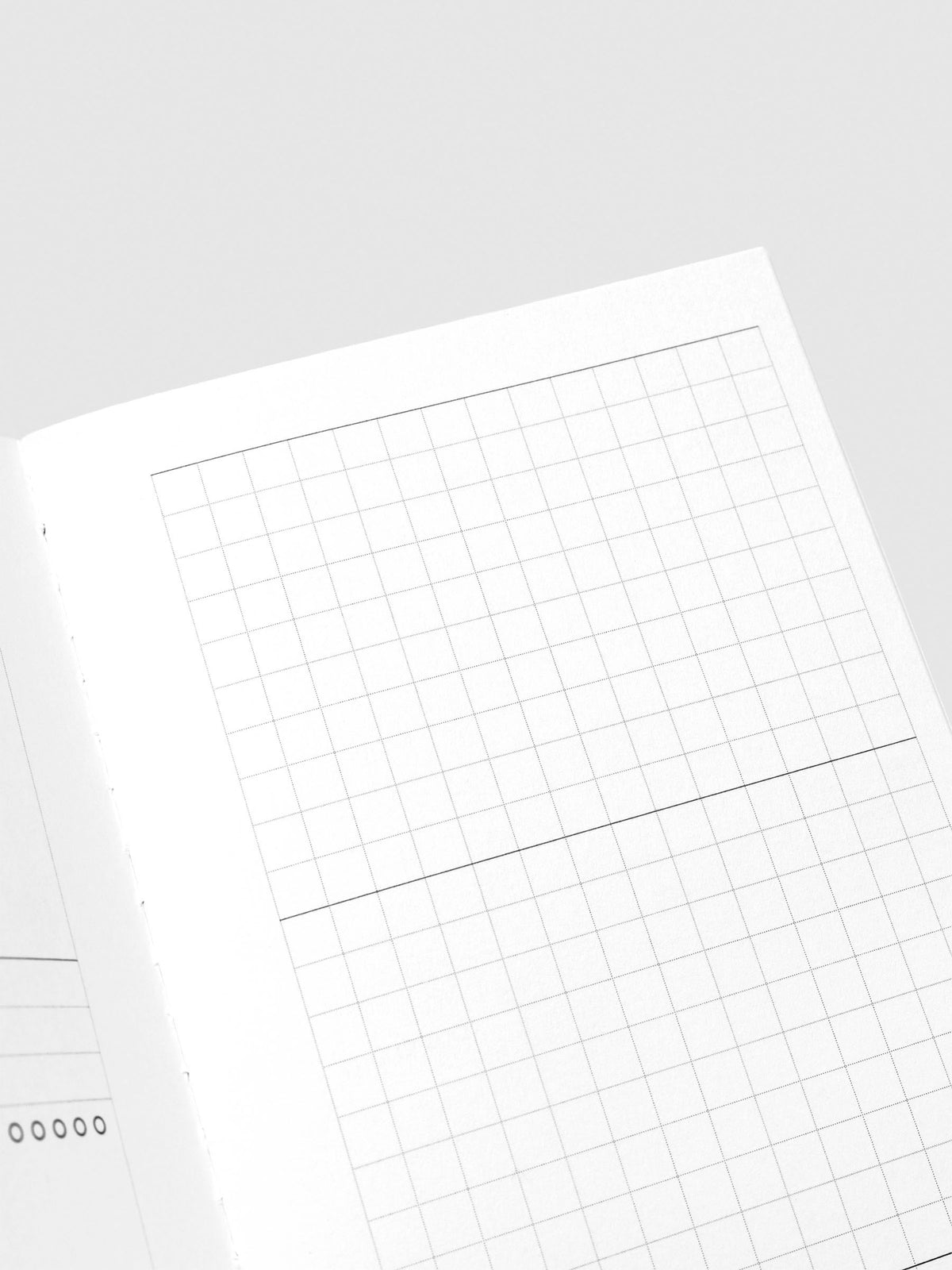 Close up image of the top right of the Experience Tracker Walnut Pocket Plus notebook page. The page is displayed on a neutral background.