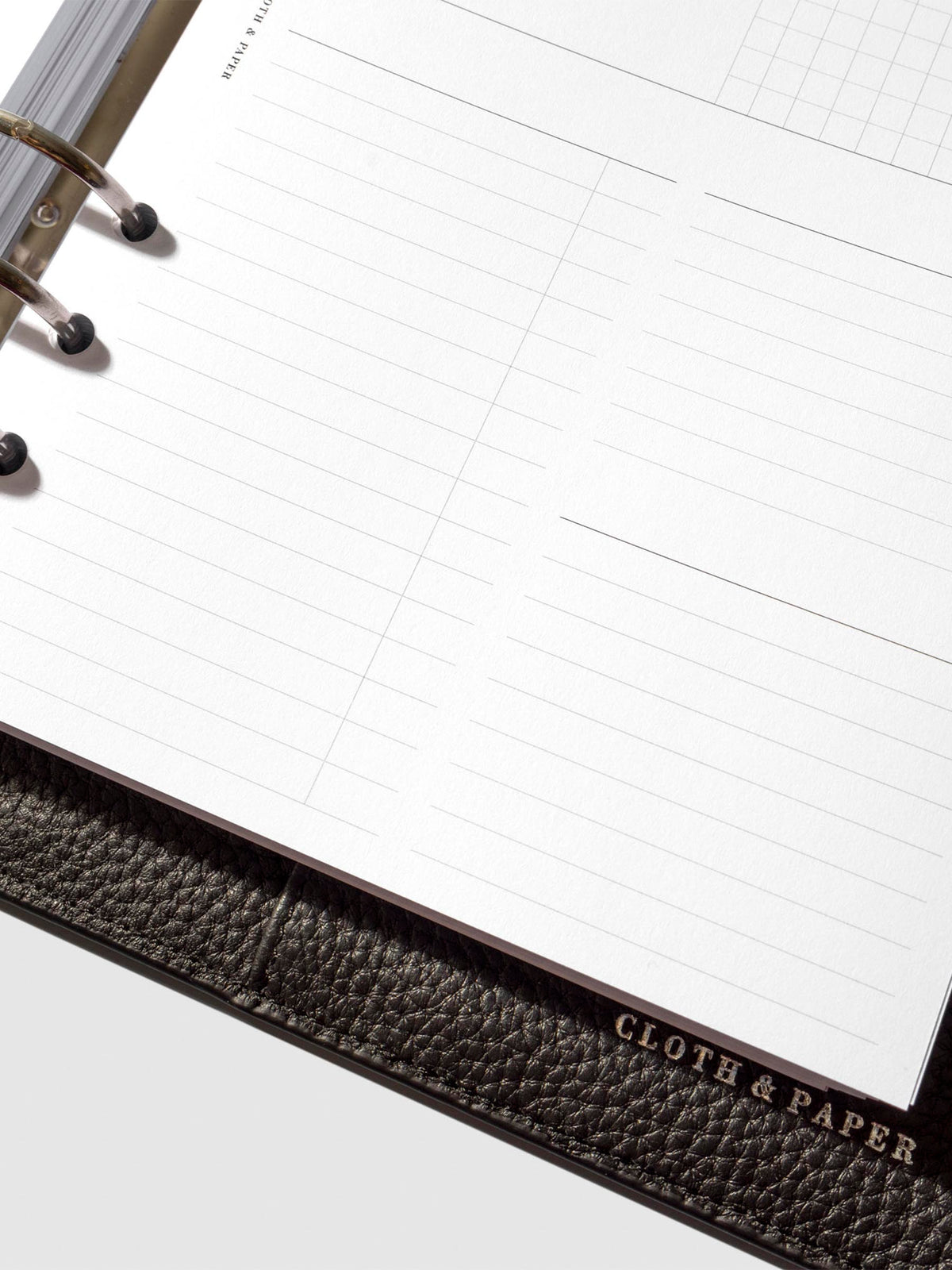 Undated Horizontal Weekly Inserts in use inside a black leather planner.