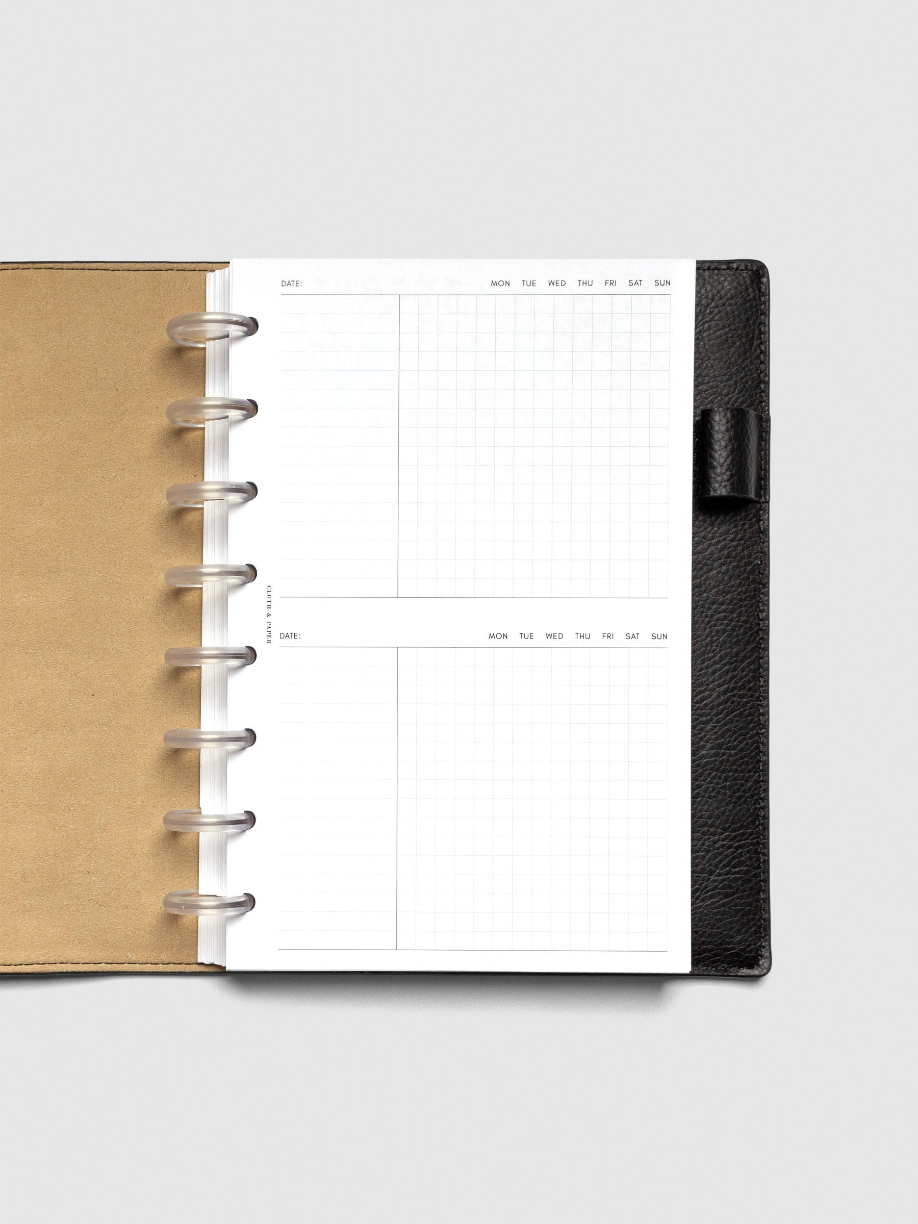 Insert in use inside a black leather planner.