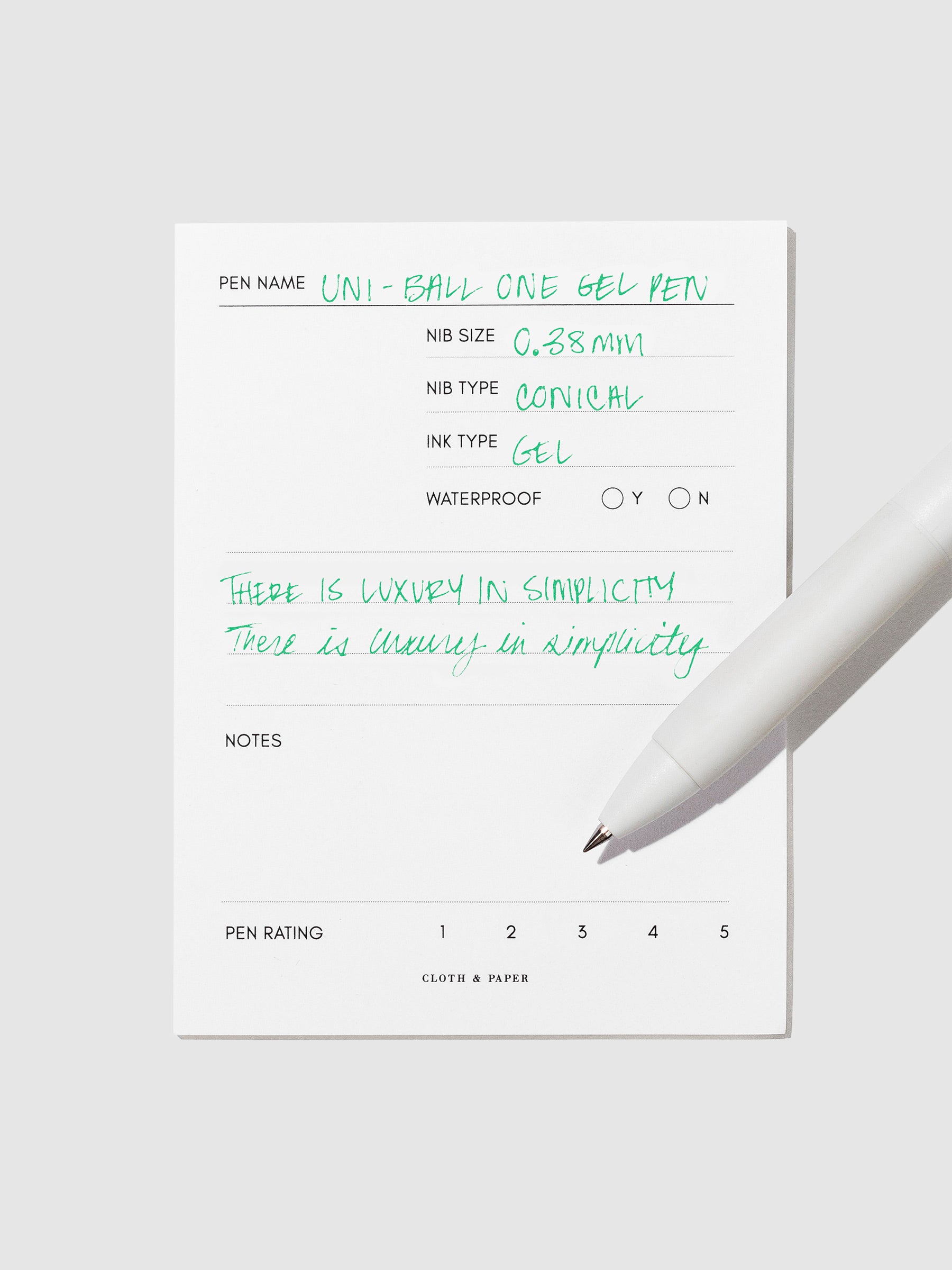 Pen tilted slightly to the right on a neutral background. Color pictured is Green.