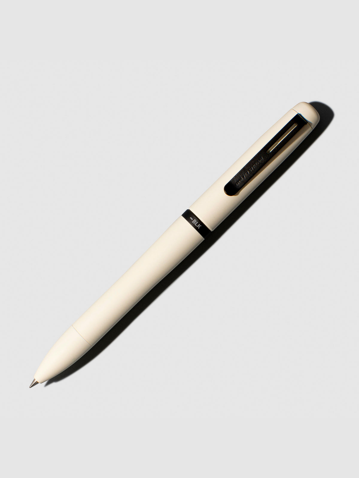 Pen shown on a neutral background with its tip exposed. Color shown is Cloudy White.