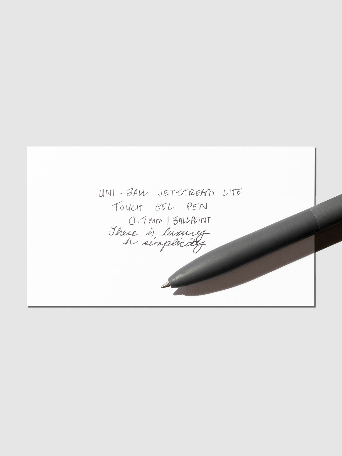 Image shows a pen test sheet of the Uni-ball Jetstream Lite Touch Gel Pen in Off Black.