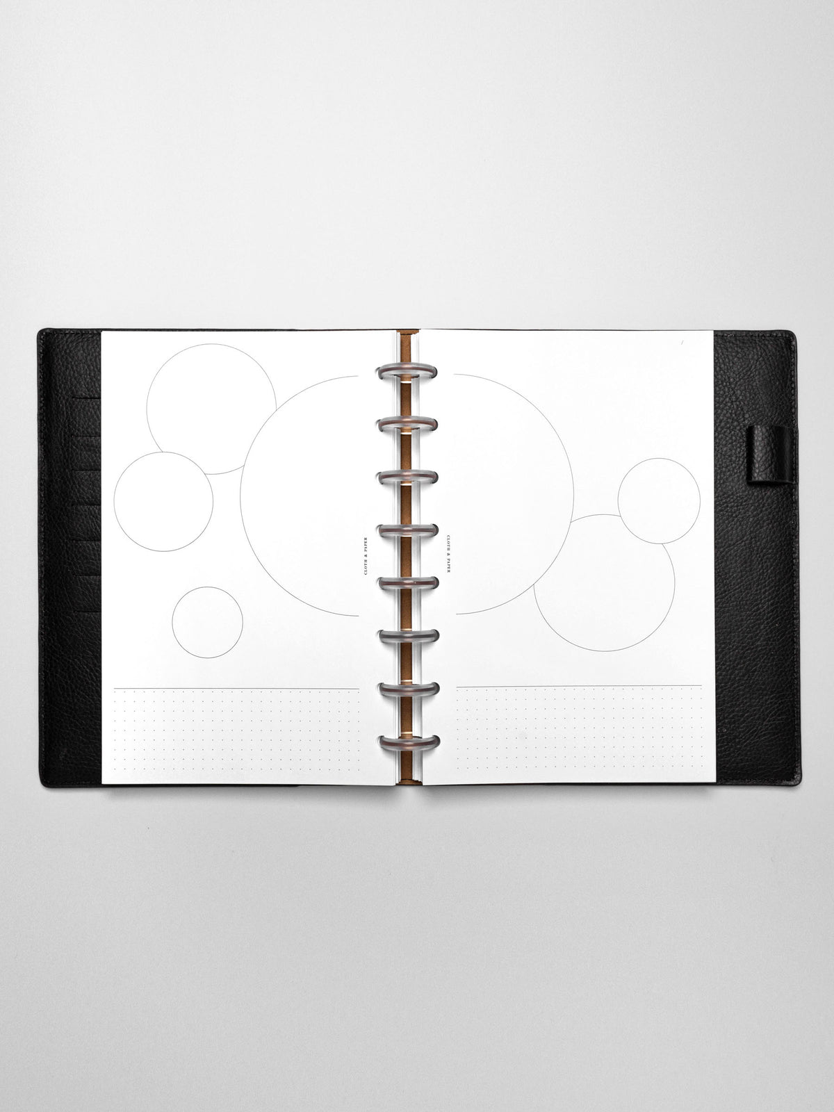 Insert in use inside a black leather planner.