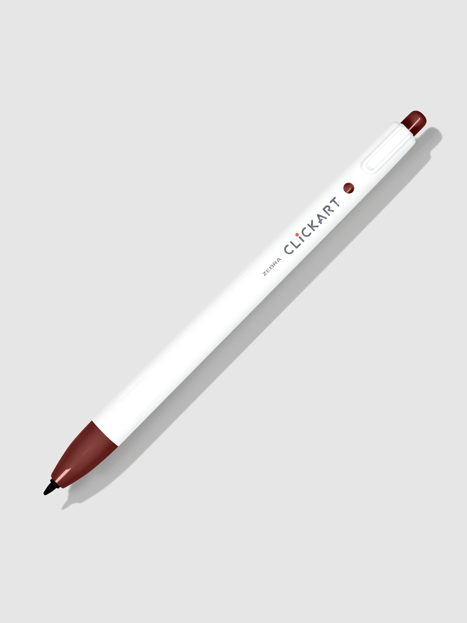 Zebra Clickart Marker, Red Black, Cloth and Paper. Marker on a neutral background tilted to the right.