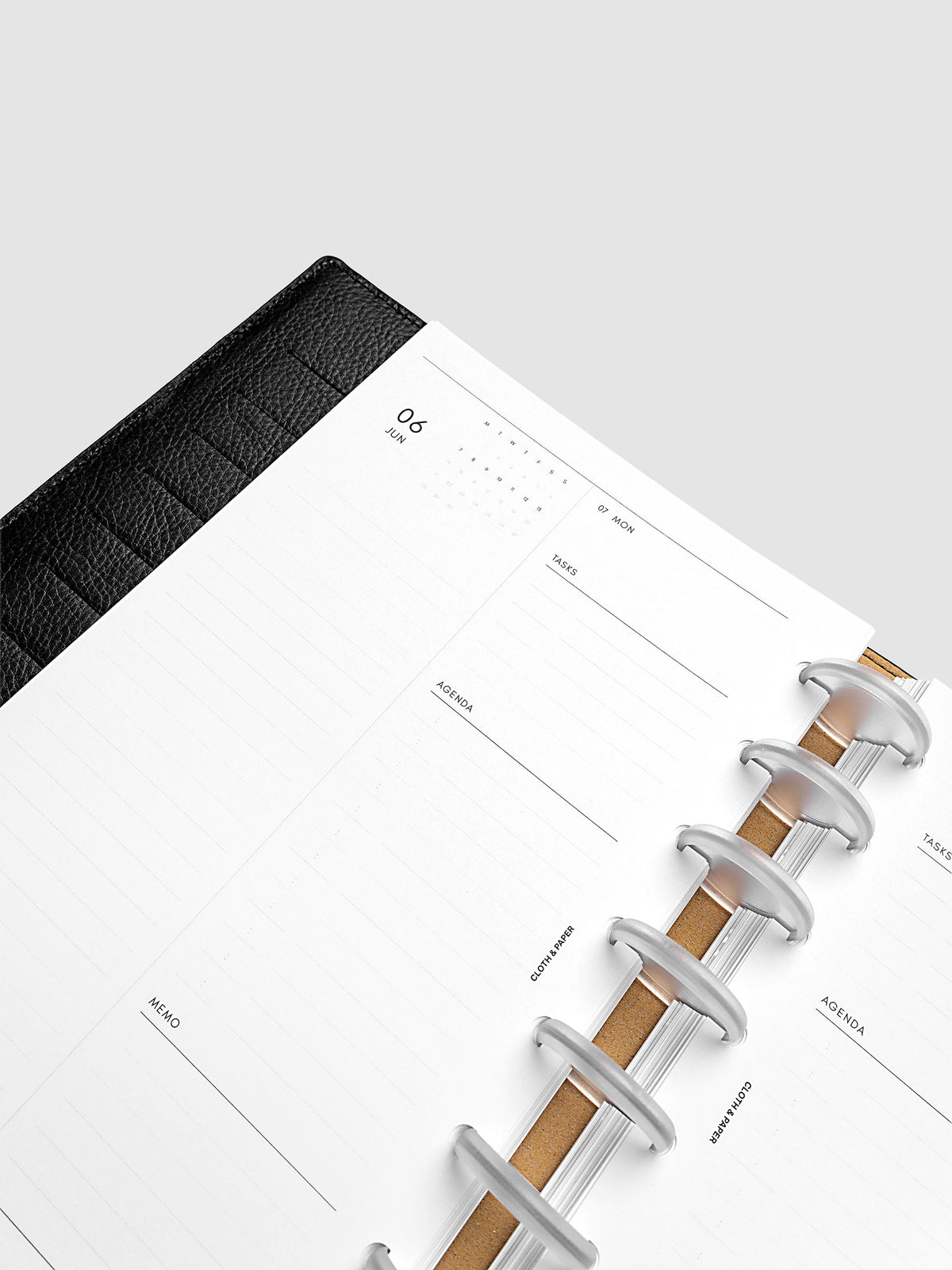 Detail view of the left page layout for the 2027 Dated Daily Inserts | Monday start in a black discbound planner