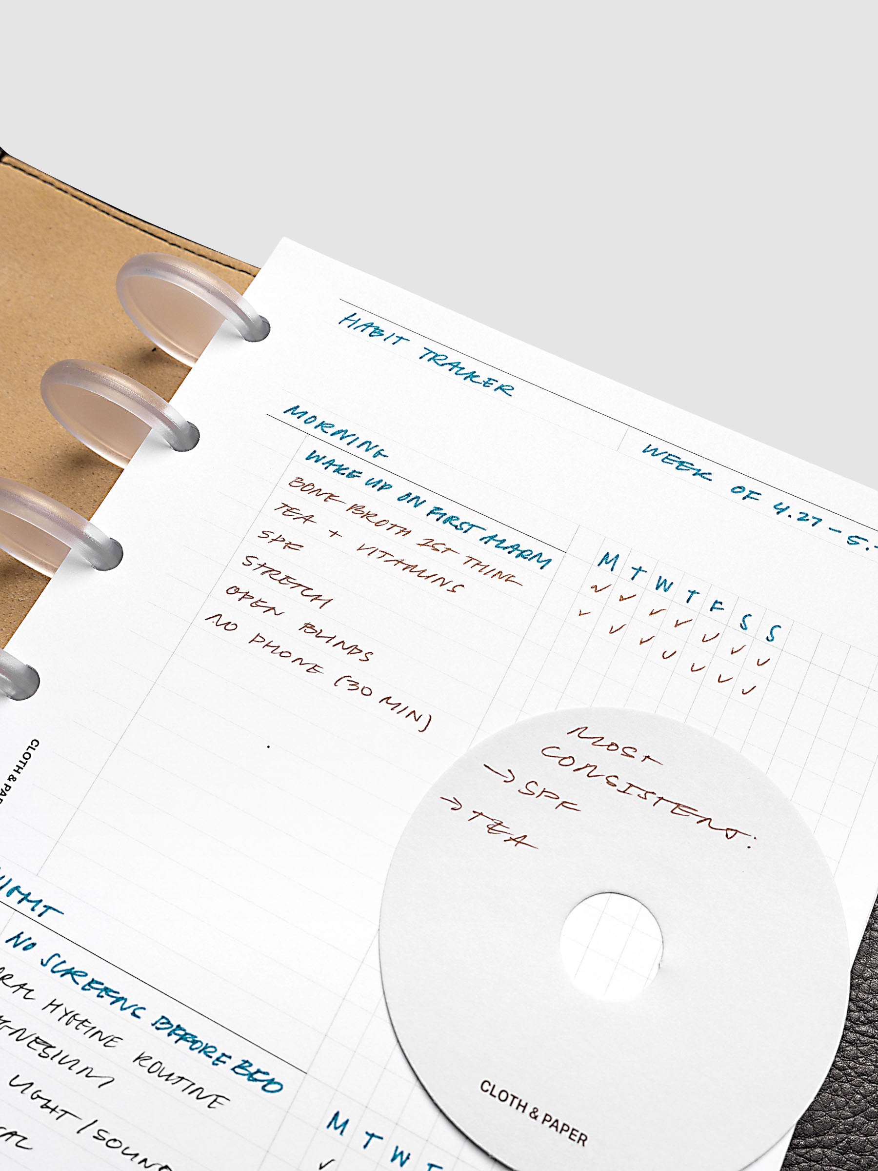 Daily Workflow Planner Inserts, Half Letter 8-Disc Punch, close-up of the top of the right page showing handwritten notes in the graph section