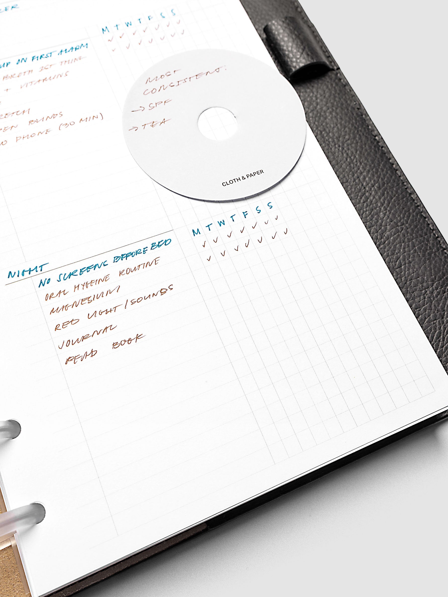 Daily Workflow Planner Inserts, Half Letter 8-Disc Punch, close-up of the bottom of the right page showing handwritten notes in the graph section