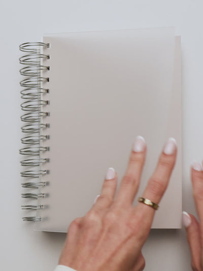 A video showing the 5 subject notebook, opening and viewing the interior and repositioning the pockets. 