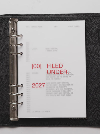 A planner flip through featuring the 2027 Front + Monthly Dashboard Overlays in the color Saffron