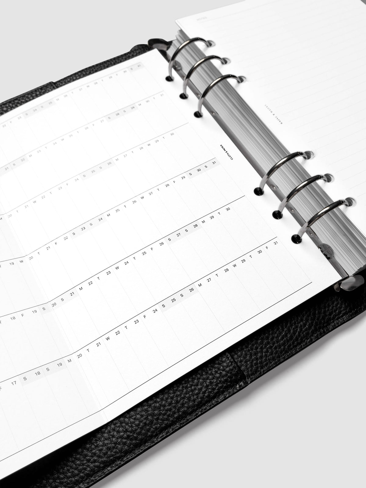 Close-up of the 2027 Dated Fold Out Insert inside an A5 6-ring planner, showing the small daily boxes used to mark holidays, birthdays, and key dates.
