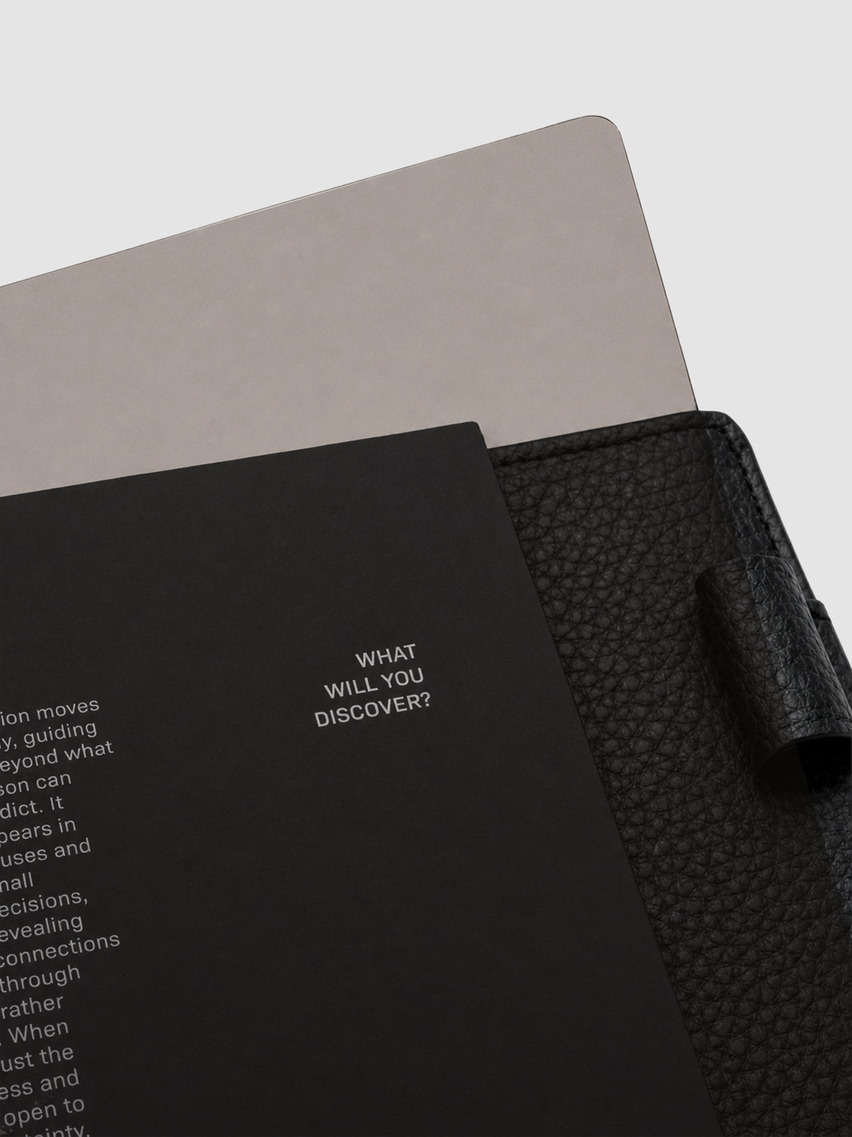 Detail view of the black Intuition Ultra Thin Planner Cover + Dashboard Set.