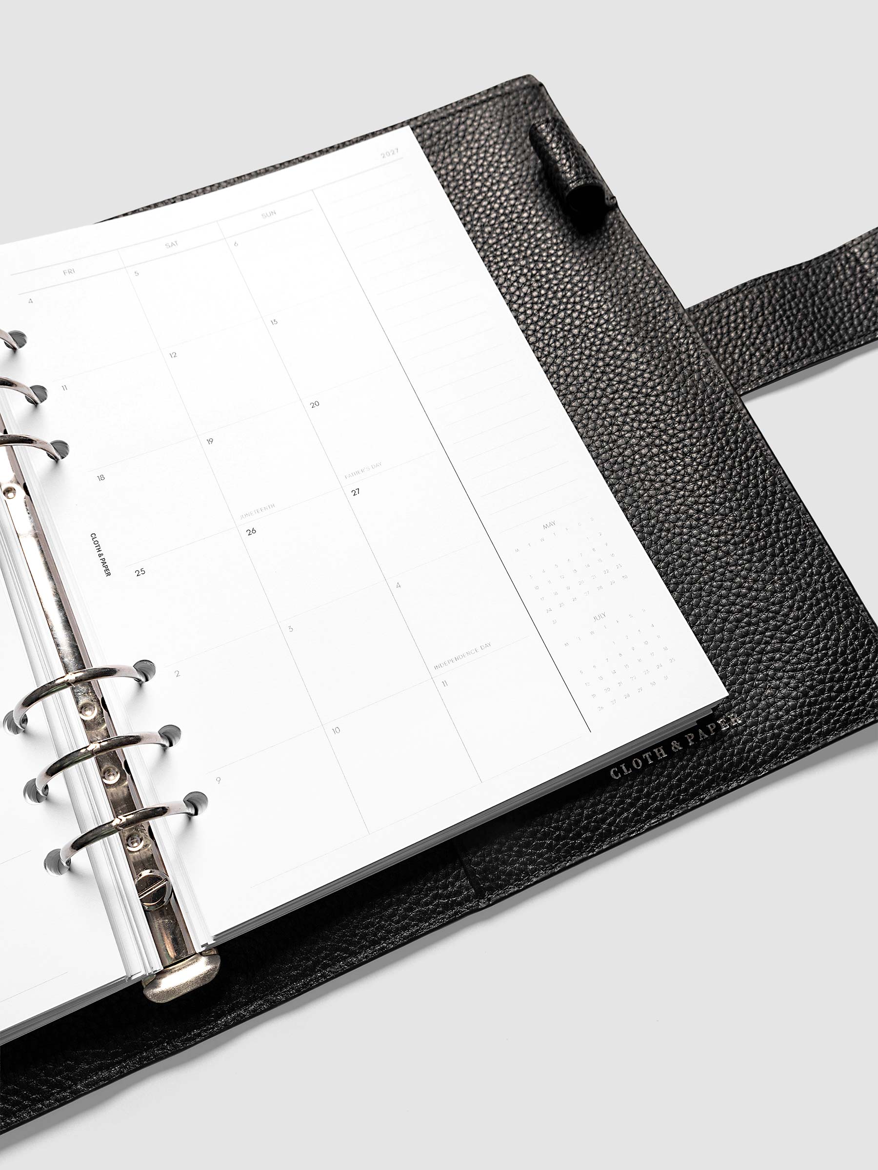 2027 Dated Monthly Planner Inserts, Monday Start, A5 6-Ring Punch, close-up detail of right page showing mini calendars in the bottom right corner and notes column shown inside a planner