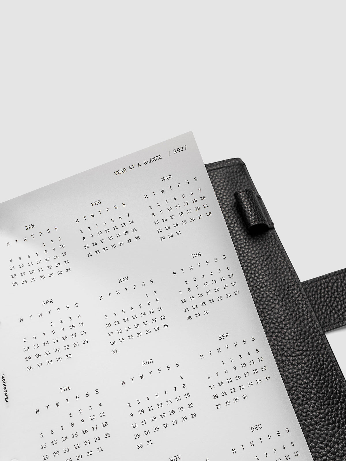 2027 Year At A Glance Dashboard Monday Start, A5 6-Ring Punch, close-up of the top right corner of the vellum dashboard showing calendar month detail and Monday-start grid layout