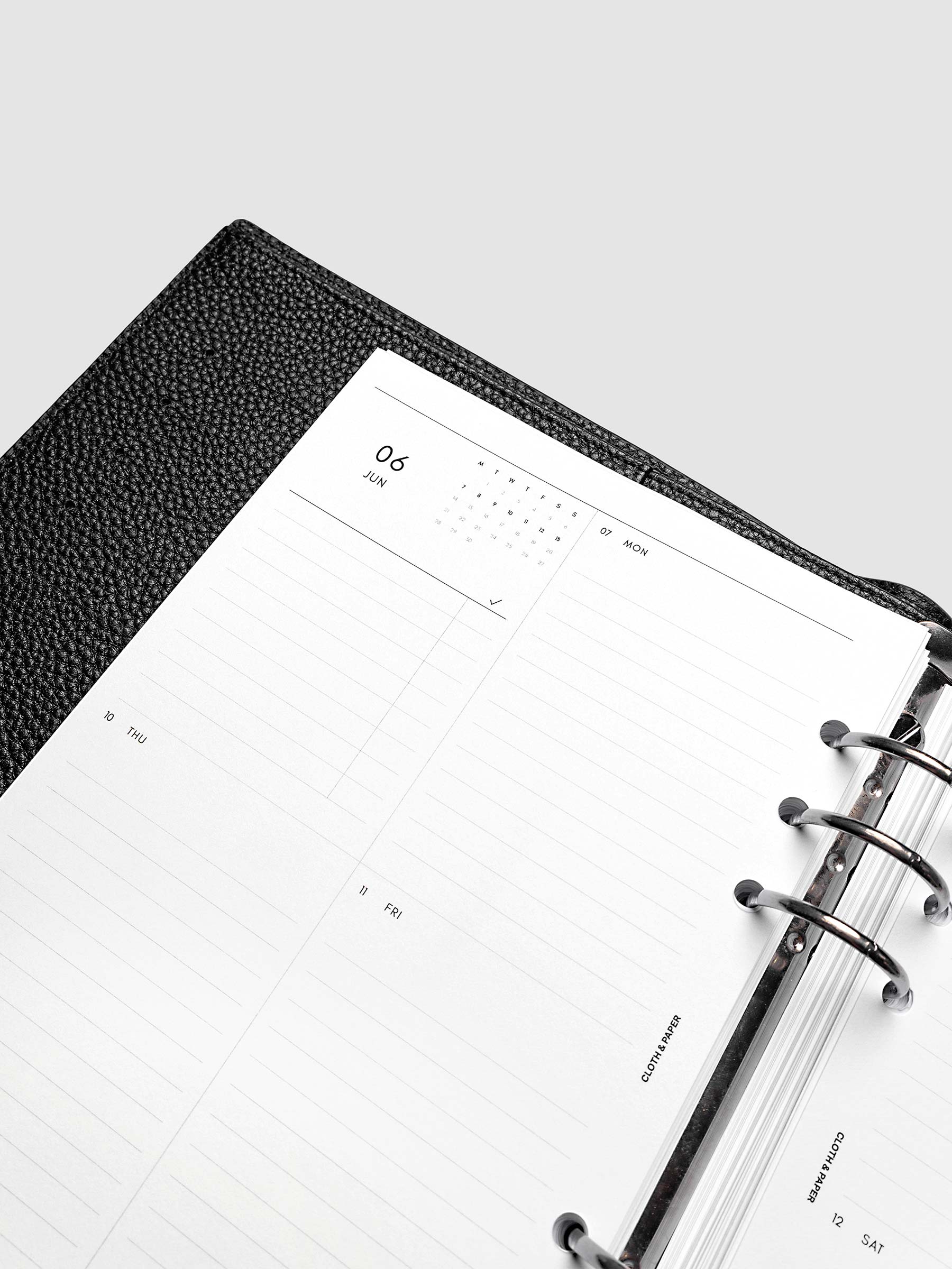 2027 Dated Weekly Vertical Planner Inserts, Monday Start, A5 6-Ring Punch, close-up of the top of the left page showing the mini monthly calendar and task list alongside Monday and the upper daily grid sections