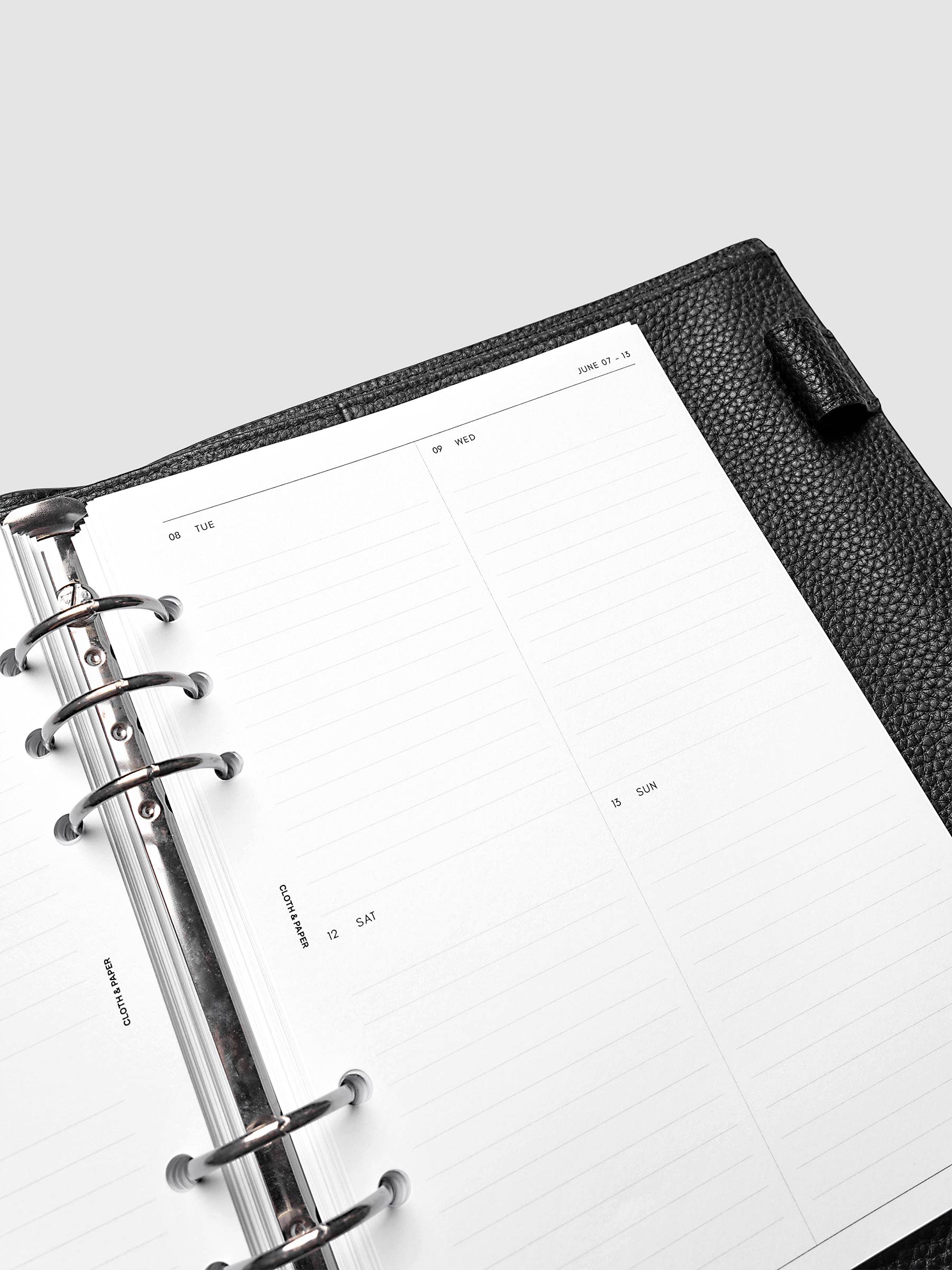 2027 Dated Weekly Vertical Planner Inserts, Monday Start, A5 6-Ring Punch, close-up of the top of the right page showing the upper daily grid sections with lined areas for notes and appointments