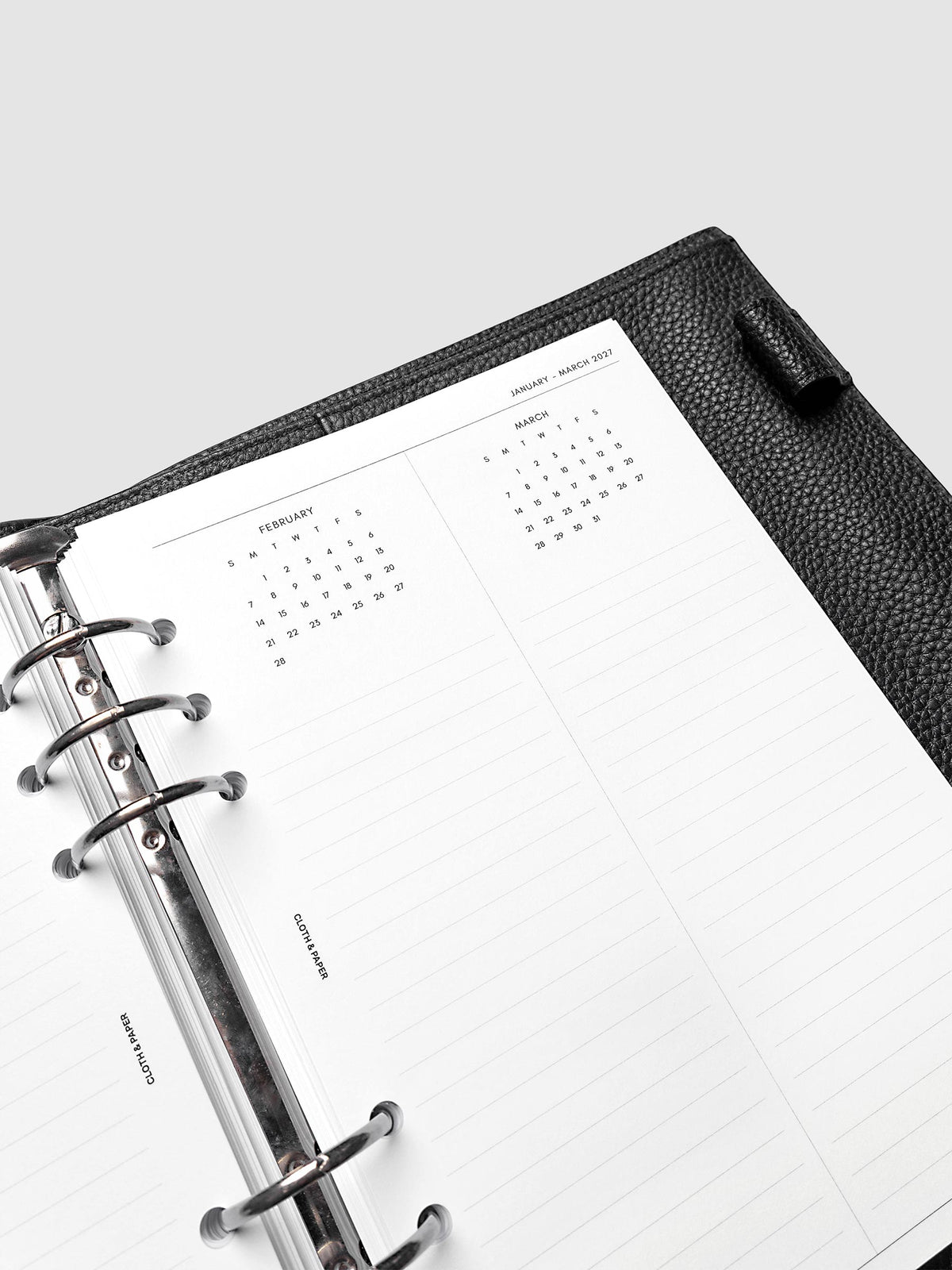2027 Dated Yearly Overview Planner Inserts Sunday Start, A5 6-Ring Punch, close-up of the top of the right page showing monthly calendar views with notes sections in Sunday-start format